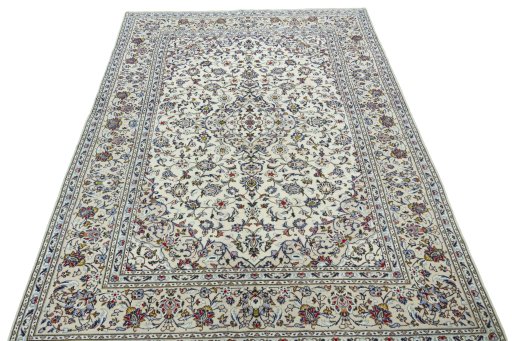Surface texture of 2000s Kashan rug with natural Wool and intricate pattern