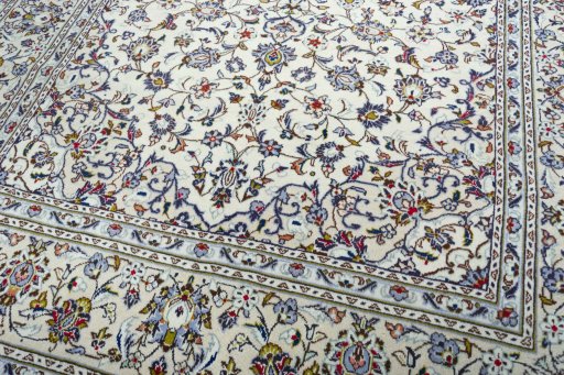 Close-up detail of 2000s Kashan rug from Iran / Persia showing Wool weave