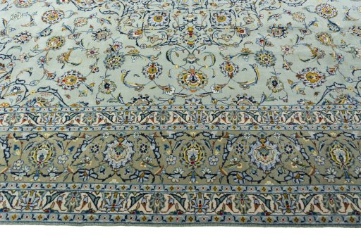 Corner detail of 1970s Kashan rug showing border pattern and Wool pile