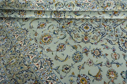 Close-up detail of 1970s Kashan rug from Iran / Persia showing Wool weave