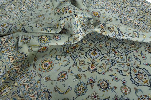 Surface texture of 1970s Kashan rug with natural Wool and intricate pattern