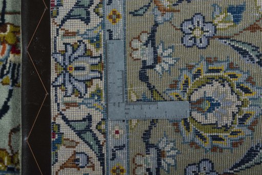 Backside of handmade 1970s Kashan rug showing knot structure and weave density