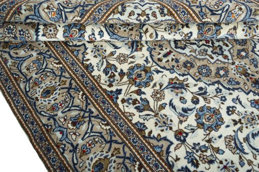 Close-up detail of 2000s Kashan rug from Iran / Persia showing Wool weave