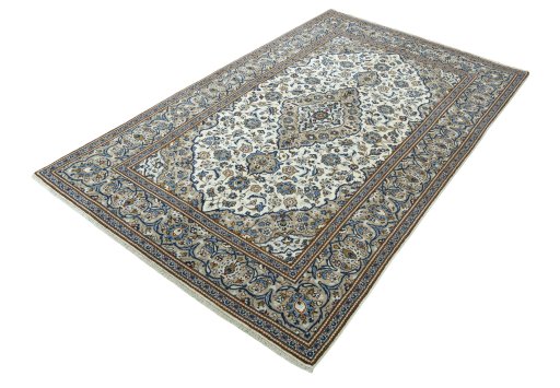 Corner detail of 2000s Kashan rug showing border pattern and Wool pile