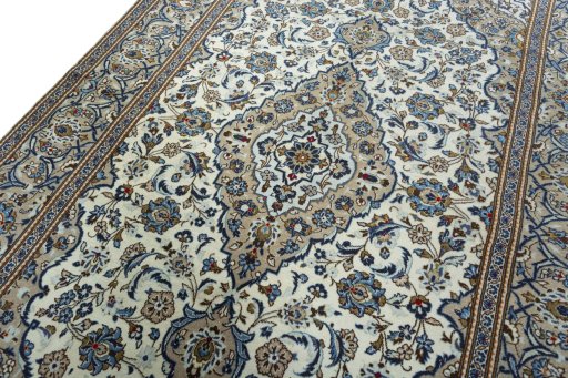 Backside of handmade 2000s Kashan rug showing knot structure and weave density