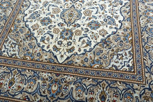 Close-up detail of 2000s Kashan rug from Iran / Persia showing Wool weave