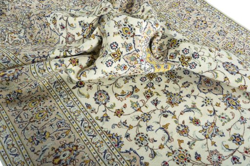 Surface texture of 2000s Kashan rug with natural Wool and intricate pattern