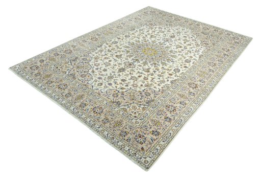 Corner detail of 2000s Kashan rug showing border pattern and Wool pile