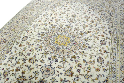 Backside of handmade 2000s Kashan rug showing knot structure and weave density