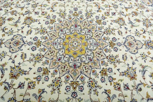 Central medallion detail of 2000s Kashan rug from Iran / Persia