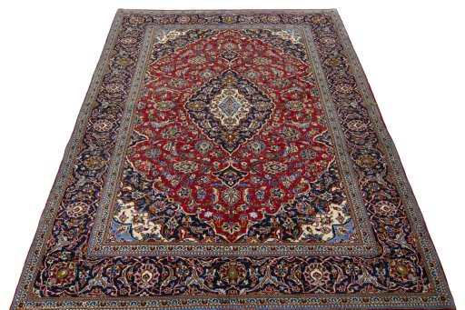 Surface texture of 2000s Kashan rug with natural Wool and intricate pattern