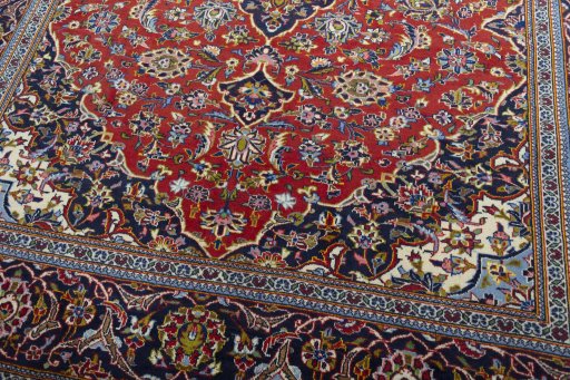 Close-up detail of 2000s Kashan rug from Iran / Persia showing Wool weave