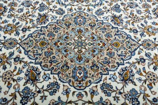 Central medallion detail of 2000s Kashan rug from Iran / Persia