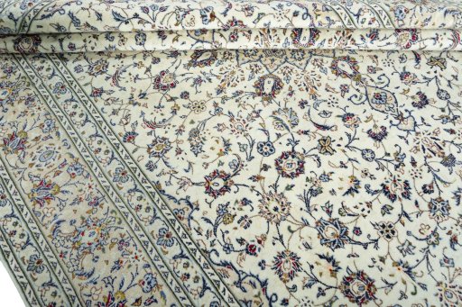 Close-up detail of 2000s Kashan rug from Iran / Persia showing Wool weave