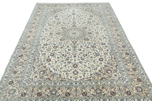 Surface texture of 2000s Kashan rug with natural Wool and intricate pattern