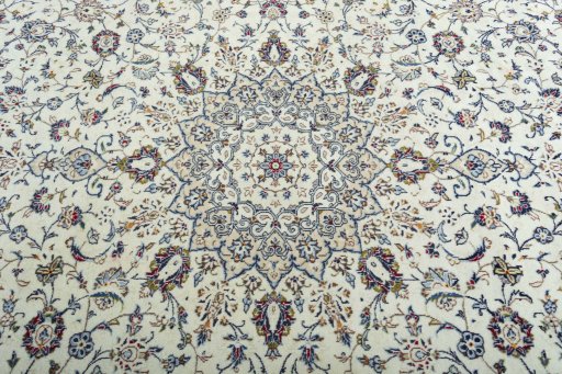 Central medallion detail of 2000s Kashan rug from Iran / Persia