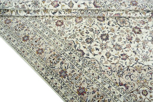 Close-up detail of 2000s Kashan rug from Iran / Persia showing Wool weave