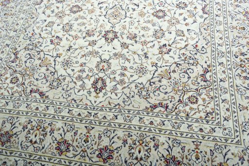 Close-up detail of 2000s Kashan rug from Iran / Persia showing Wool weave