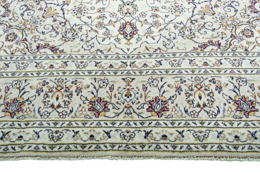 Full view of 2000s Kashan rug from Iran / Persia, 301 × 197 cm in Beige tones