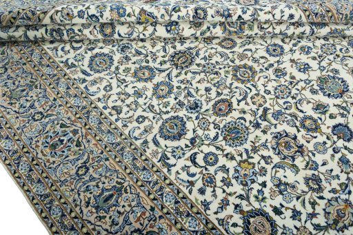 Close-up detail of 2000s Kashan rug from Iran / Persia showing Wool weave