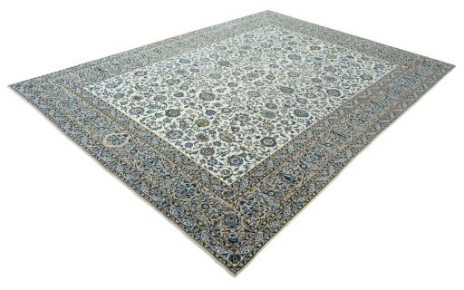 Corner detail of 2000s Kashan rug showing border pattern and Wool pile