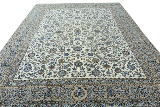 Surface texture of 2000s Kashan rug with natural Wool and intricate pattern