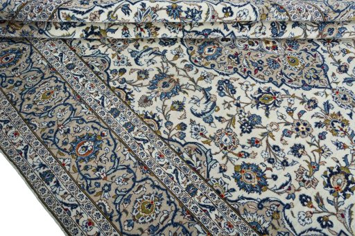 Close-up detail of 2000s Kashan rug from Iran / Persia showing Wool weave
