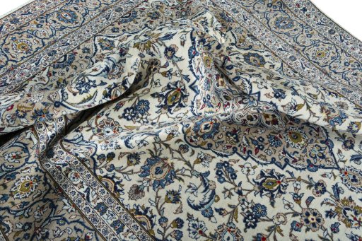 Surface texture of 2000s Kashan rug with natural Wool and intricate pattern