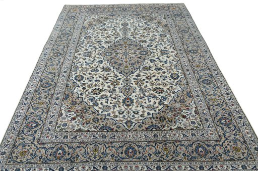 Surface texture of 2000s Kashan rug with natural Wool and intricate pattern