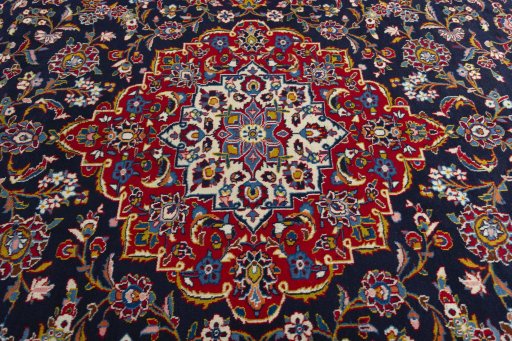 Central medallion detail of 2000s Kashan rug from Iran / Persia