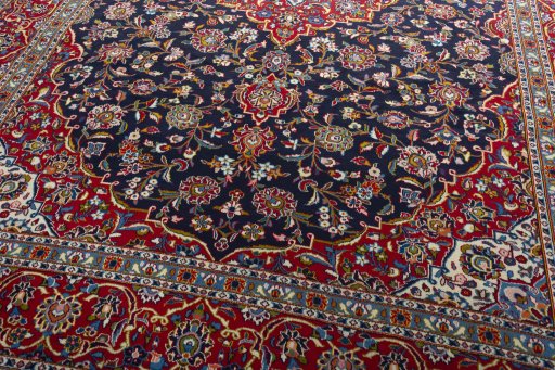 Close-up detail of 2000s Kashan rug from Iran / Persia showing Wool weave