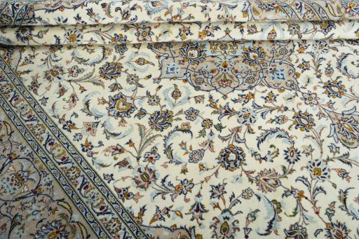 Close-up detail of 2000s Kashan rug from Iran / Persia showing Wool weave