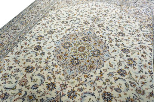 Backside of handmade 2000s Kashan rug showing knot structure and weave density