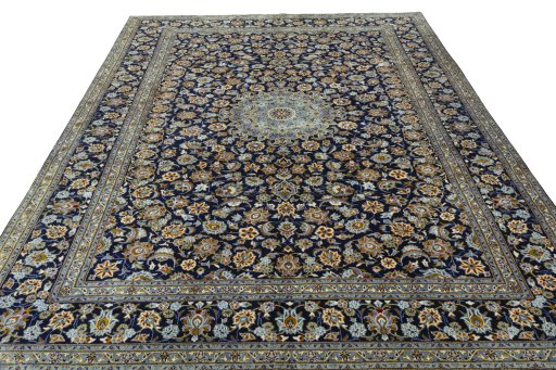 Surface texture of 2000s Kashan rug with natural Wool and intricate pattern