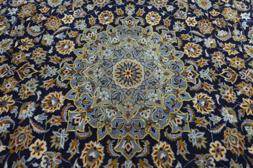 Central medallion detail of 2000s Kashan rug from Iran / Persia