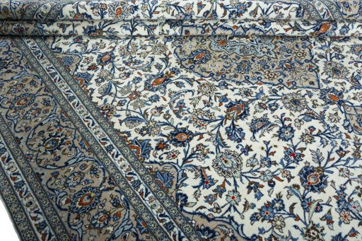 Close-up detail of 2000s Kashan rug from Iran / Persia showing Wool weave