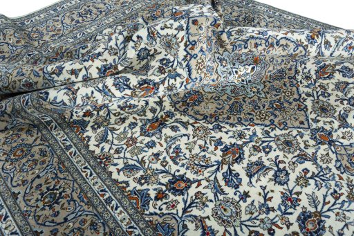 Surface texture of 2000s Kashan rug with natural Wool and intricate pattern