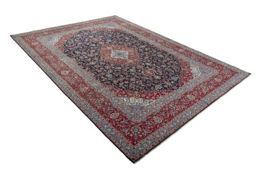 Close-up detail of 2000s Kashan rug from Iran / Persia showing Wool weave