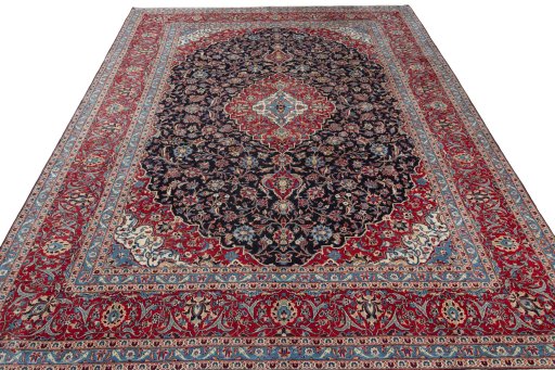 Surface texture of 2000s Kashan rug with natural Wool and intricate pattern