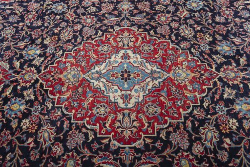 Central medallion detail of 2000s Kashan rug from Iran / Persia