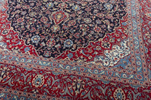 Close-up detail of 2000s Kashan rug from Iran / Persia showing Wool weave