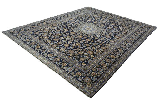Corner detail of 2000s Kashan rug showing border pattern and Wool pile