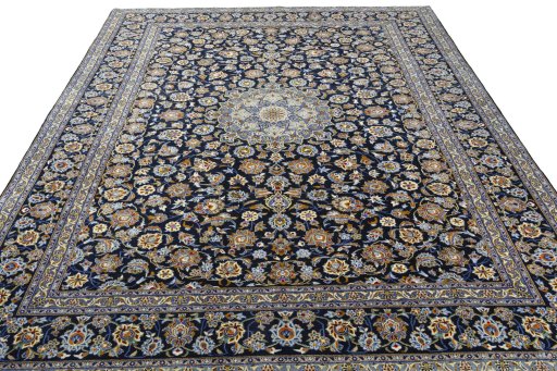 Surface texture of 2000s Kashan rug with natural Wool and intricate pattern