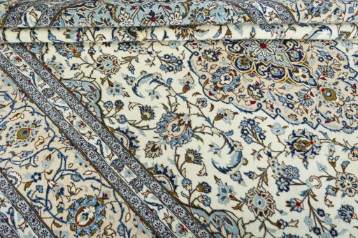 Close-up detail of 2000s Kashan rug from Iran / Persia showing Wool weave