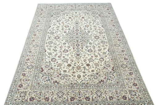 Surface texture of 2000s Kashan rug with natural Wool and intricate pattern