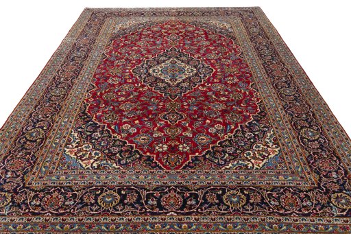 Surface texture of 2000s Kashan rug with natural Wool and intricate pattern