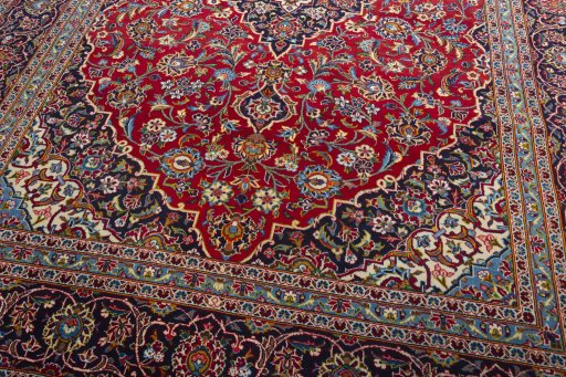 Close-up detail of 2000s Kashan rug from Iran / Persia showing Wool weave