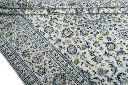 Close-up detail of 2000s Kashan rug from Iran / Persia showing Wool weave