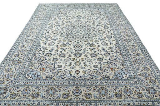 Surface texture of 2000s Kashan rug with natural Wool and intricate pattern
