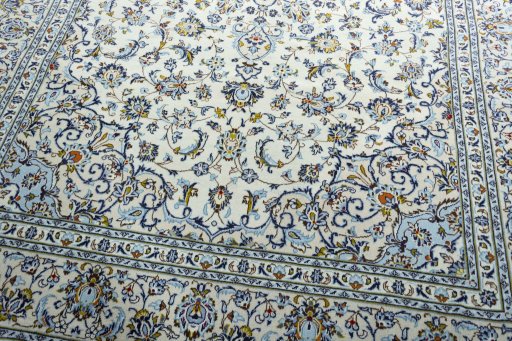 Close-up detail of 2000s Kashan rug from Iran / Persia showing Wool weave